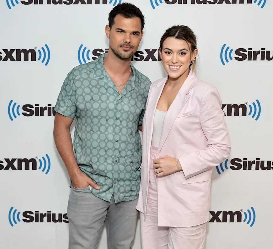 Tay Lautner pregnant announcement with Taylor Lautner holding sonogram photos in a field