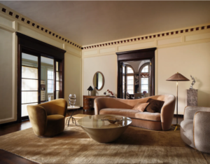 Laura Harrier Crate & Barrel collection sofa and vanity styled in Old Hollywood setting